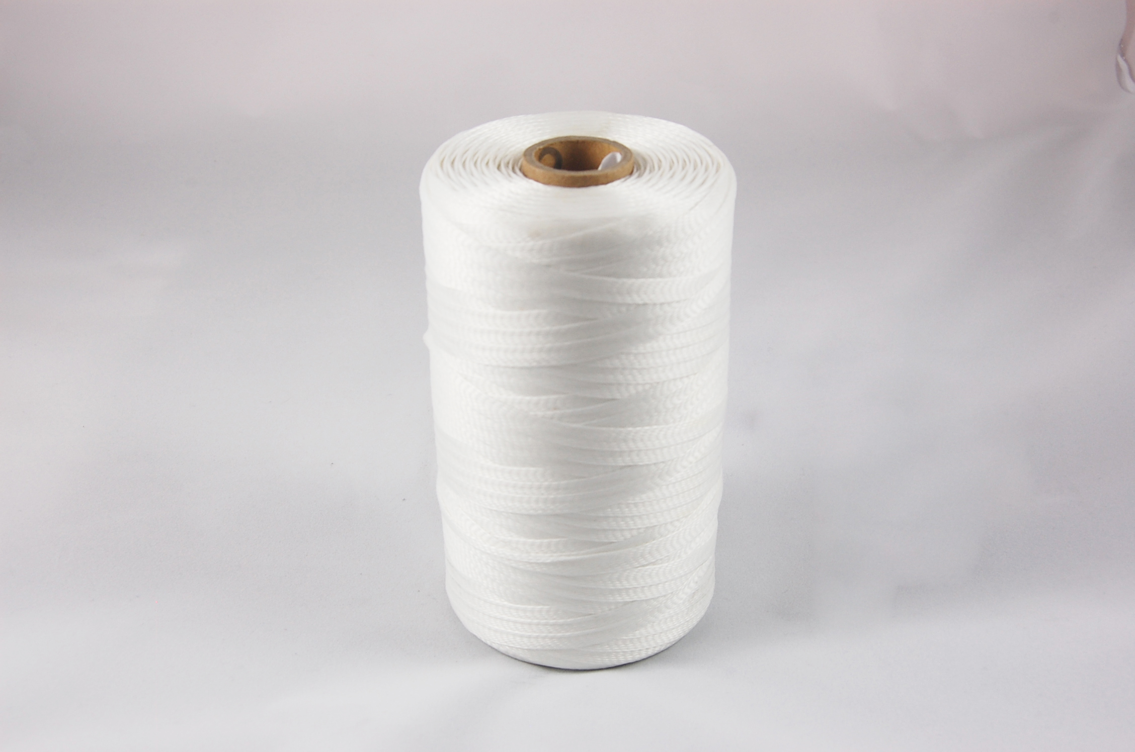 .080" DHS3 .010" Flat Braided Polyester Tape 155°C, natural, .080" wide x  500 YD spool